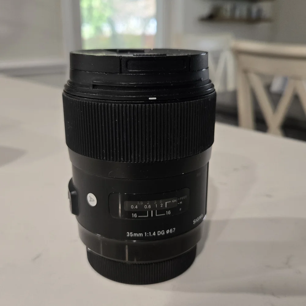 Sigma 35mm f/1.4 DG HSM ART Lens for Canon EOS Cameras With Lens Hood + Pouch